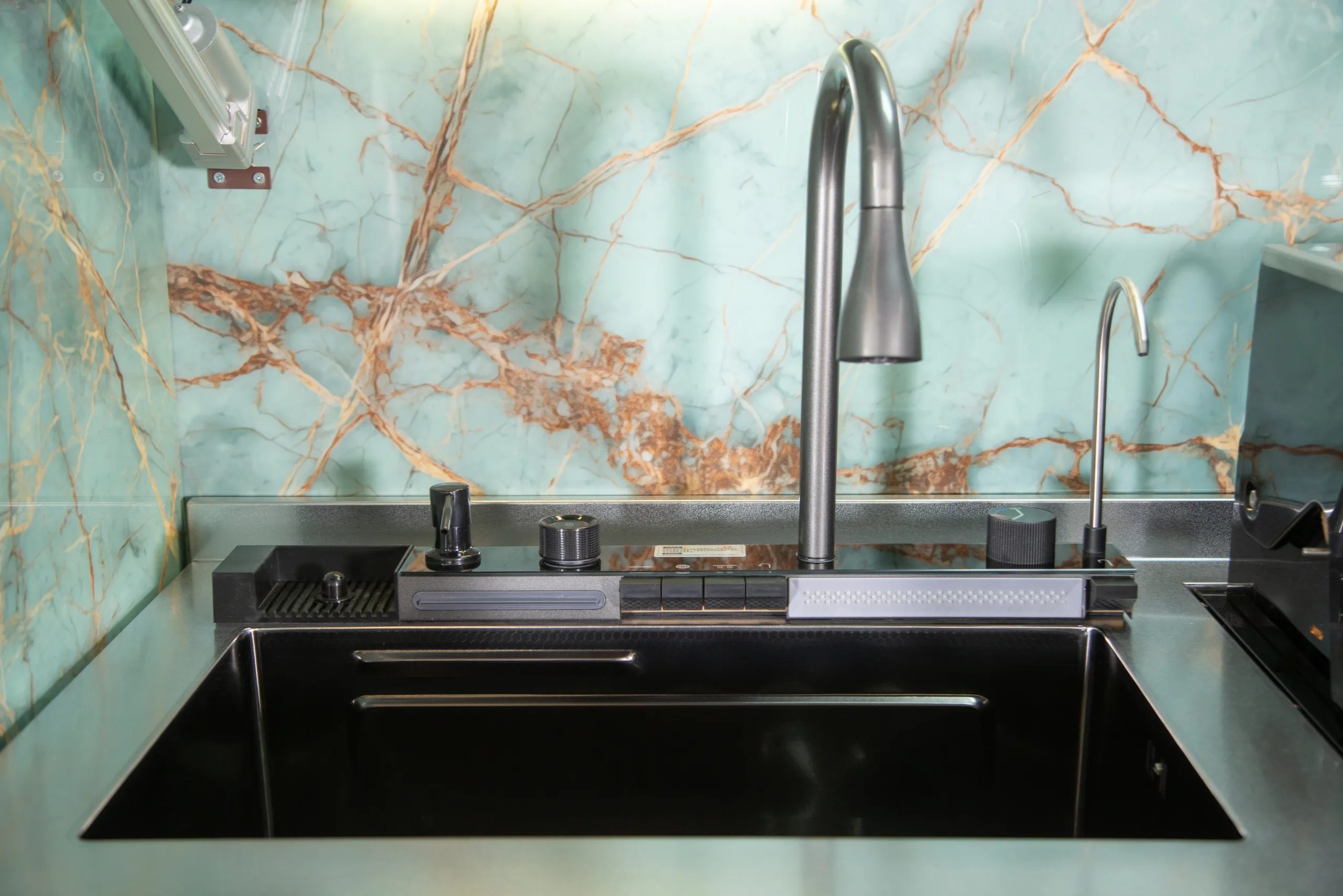 Outdoor kitchen sink with tall faucet and weather-resistant counter