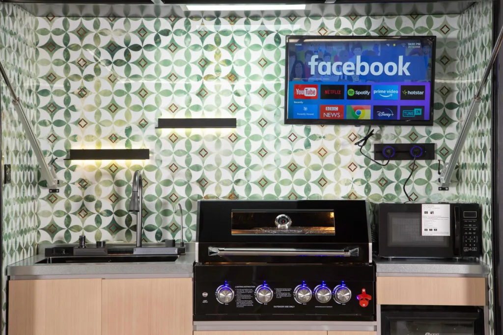 Outdoor kitchen appliance kit installed in a premium cooking area