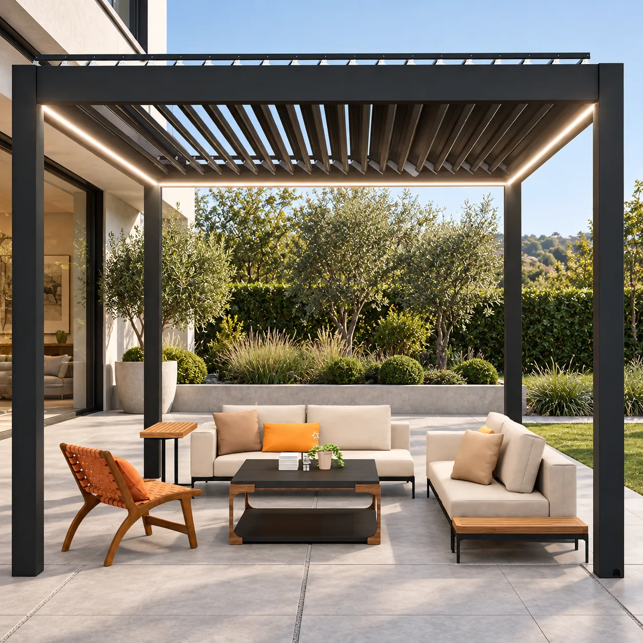 Complete charcoal motorized pergola over large-format light-gray patio pavers